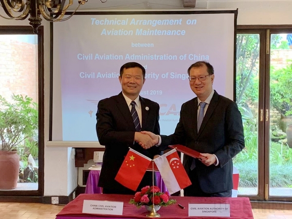 李健与岑景祺签署《中国民用航空局和新加坡民航局航空维修技术安排》.jpg 李健与岑景祺签署《中国民用航空局和新加坡民航局航空维修技术安排》.jpg