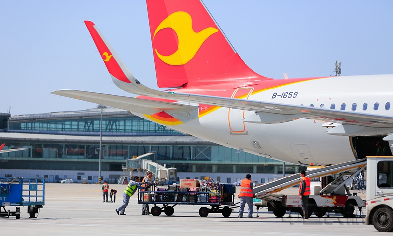 水印 图 天津航空紧锣密鼓保障假期航班1.jpg 水印 图 天津航空紧锣密鼓保障假期航班1.jpg